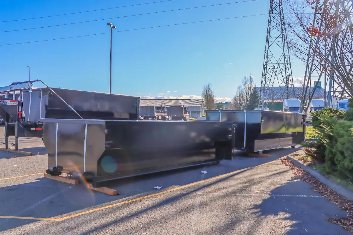 Roll-off dumpster ready for waste disposal at job site for Demolition Dumpster Rental in Hamden